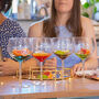 Set Of Four Coloured Gin Glasses With Phrases, thumbnail 2 of 4
