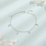 Sterling Silver Tiny Cz Moon And Star Bracelet, thumbnail 1 of 11