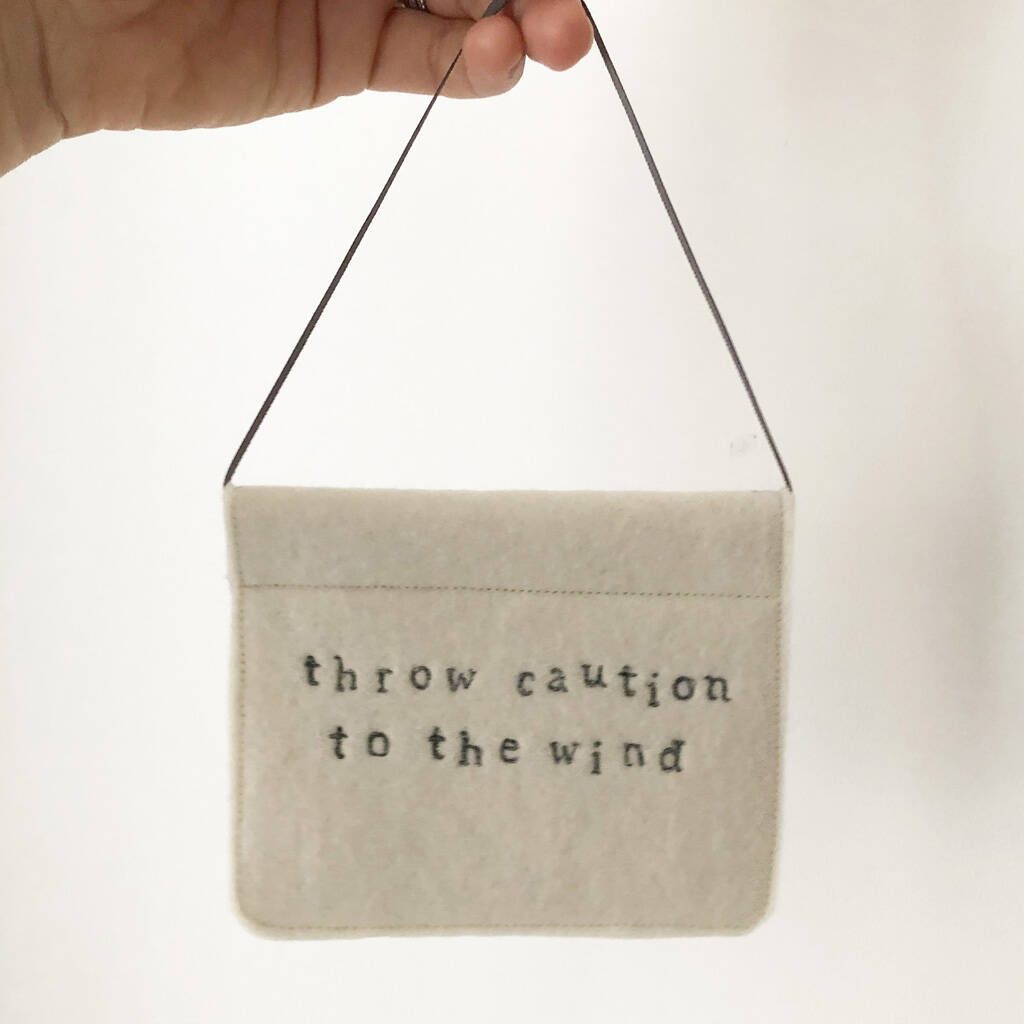 throw-caution-to-the-wind-felt-embroidered-banner-by-lotta-s-house