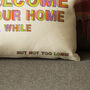 'Welcome to Our Home' Humorous Decorative Cushion, thumbnail 5 of 5