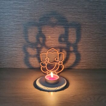 Ganesh Wood And Clay Shadow Tealight Holder, 4 of 9