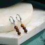Sterling Silver Genuine Tiger's Eye Stone Trio Huggie Hoop Earrings, thumbnail 1 of 10