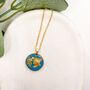 Elegant Blue Gold Foil Circle Necklace, Planet Earth, thumbnail 1 of 10
