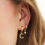 Crescent Moon And Star Huggie Hoops In Gold Plating, thumbnail 1 of 8