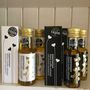 Two Black And Two White Truffle Oil Packs, thumbnail 1 of 9