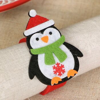 Set Of Four Christmas Penguin Felt Napkin Rings, 3 of 4