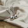 Large Silver Plated Christmas Ball Ear Drop Earring, thumbnail 2 of 9