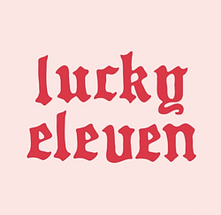 Lucky Eleven logo on pink background.