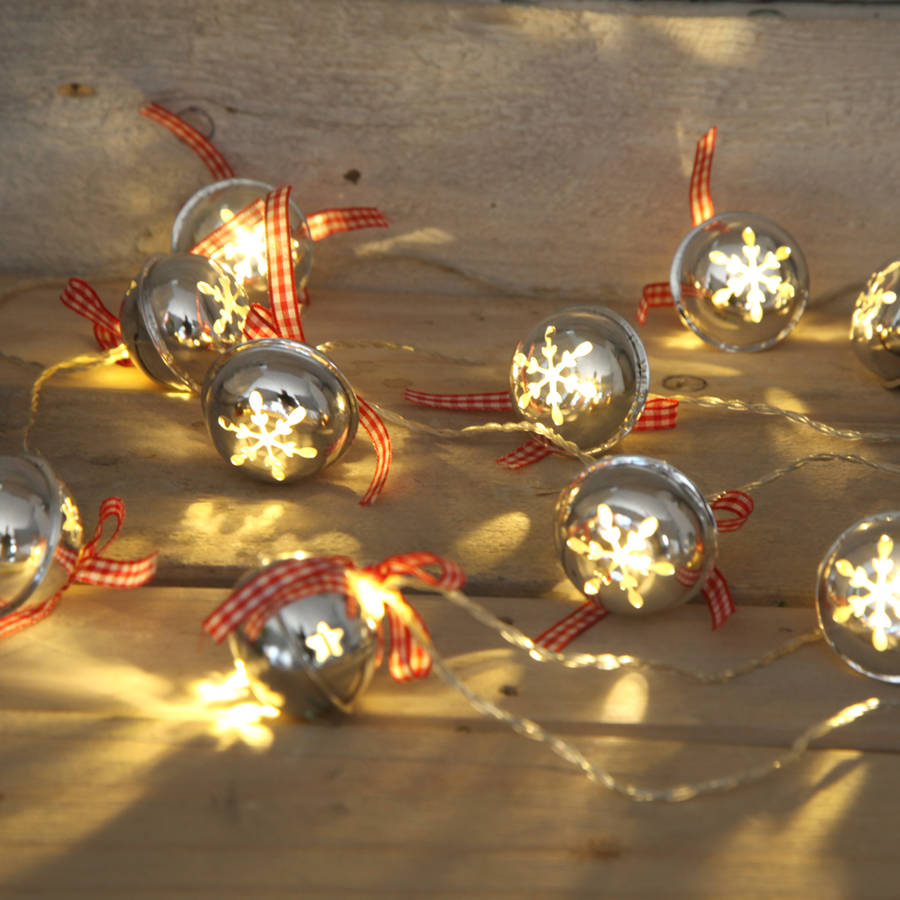 Jingle bells christmas garland light by red berry apple 