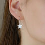 Sterling Silver Hammered Star Drop Earrings, thumbnail 1 of 6