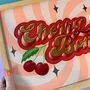 'Cherry Bomb' Reverse Glass Gold Leaf Wall Art Sign, thumbnail 3 of 12