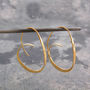 Tapered Gold Plated Sterling Silver Hoop Earrings, thumbnail 1 of 7