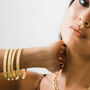 Cleo Brass And Gold Plated Bangle, thumbnail 1 of 2