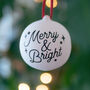 Merry And Bright Ceramic Christmas Bauble, thumbnail 1 of 5
