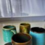 Set Of Four Reactive Glaze Mugs In Lagoon Glazes, thumbnail 3 of 9