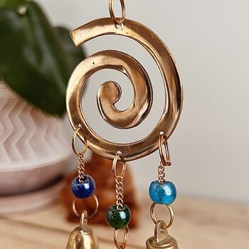 Handmade Fair Trade Brass Swirl Bell Wind Chime, 2 of 6