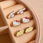 Hello Kitty Cinnamon Roll And Pompompurin Stud Earring Set, thumbnail 1 of 7