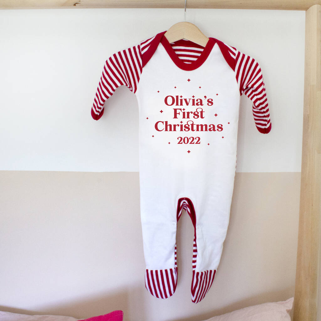 'Babies First Christmas' Pyjamas Or Rompersuit, 1 of 2