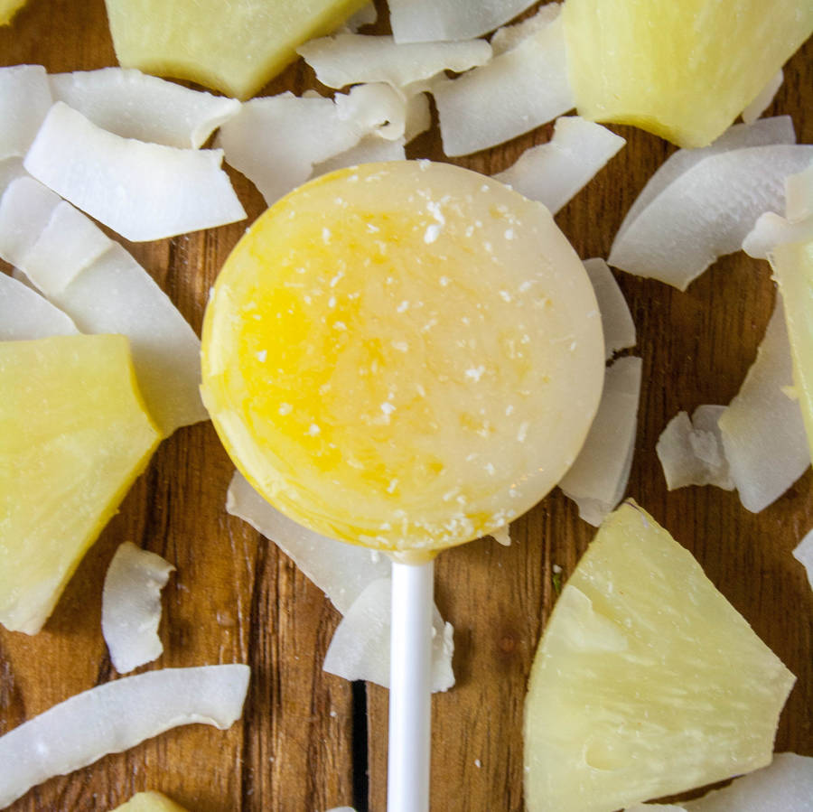 five alcoholic piña colada lollipops by holly's lollies