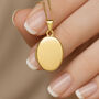 Personalised Solid 9ct Gold Plain Oval Locket, thumbnail 1 of 8