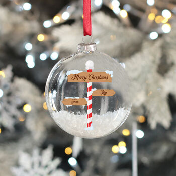 North Pole Signpost Christmas Snow Filled Glass Bauble, 3 of 7