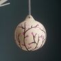 Cherry Blossom Hand Painted Ceramic Bauble, thumbnail 1 of 5