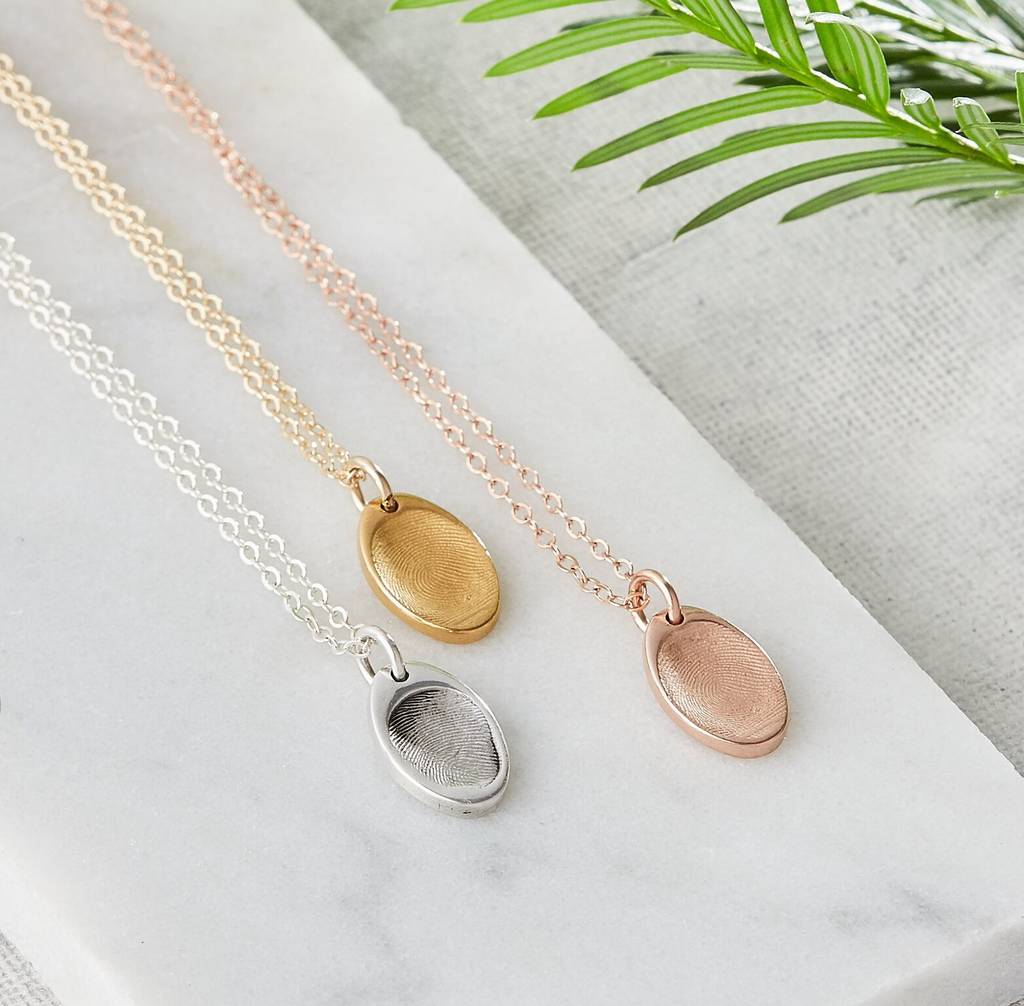 personalised tiny fingerprint oval charm necklace by button and bean