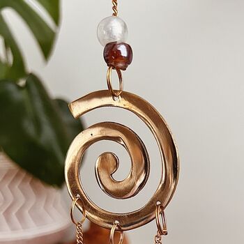 Handmade Fair Trade Brass Swirl Bell Wind Chime, 6 of 6
