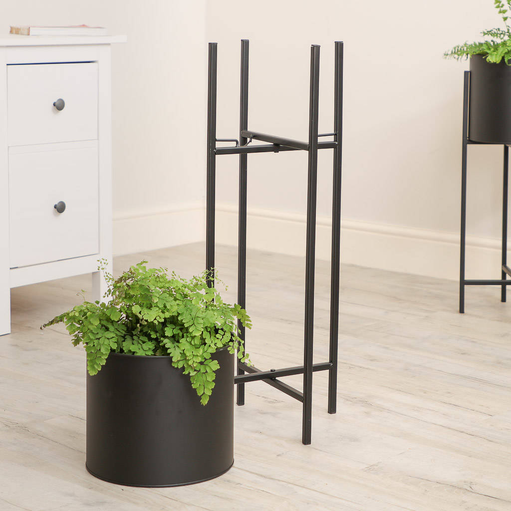 contemporary black metal drum planters with stand by dibor