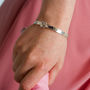 Personalised Crossover Bangle With Silver Daisy, thumbnail 3 of 6