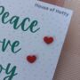 Peace Love And Joy Christmas Love Heart Earrings, thumbnail 2 of 4