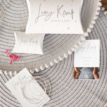 Sterling Silver Mini Textured Mismatch Star And Moon Earrings, 3 of 3