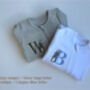 Easter Initial Personalised Baby Zip Sleepsuit | Newborn Essentials Design #E4, thumbnail 3 of 7