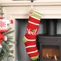 Personalised Noel Candy Cane Stripe Knit Stocking, thumbnail 1 of 9