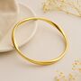 Gold Plated Sterling Silver Soft Twist Hollow Slave Bangle, thumbnail 1 of 3