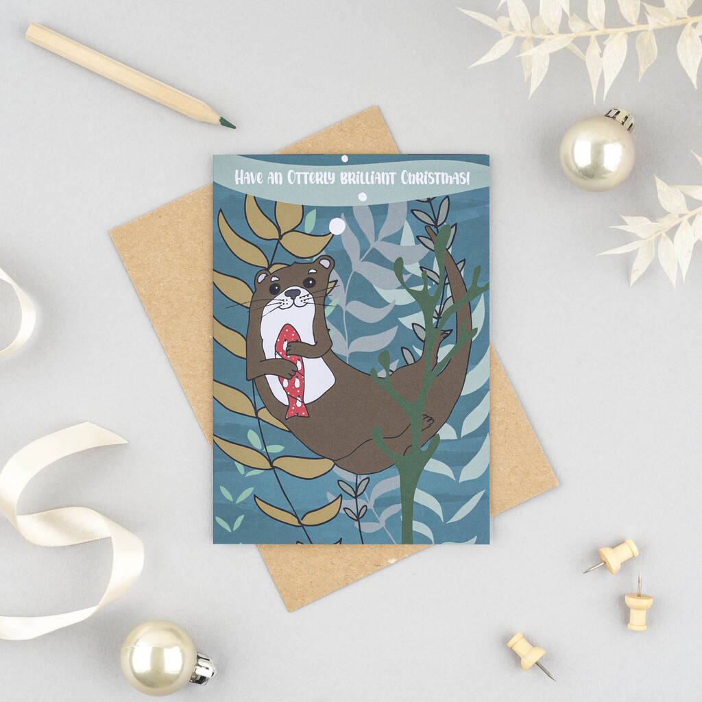 Otter With Present Christmas Card, 1 of 3