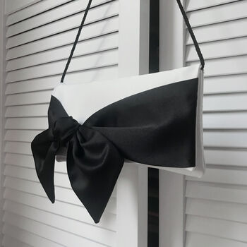 Ivory And Black Satin Bow Bridal Clutch Handbag Hope, 4 of 7