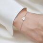 Sterling Silver Tiny Heart With Starburst Cz Bracelet, thumbnail 1 of 12