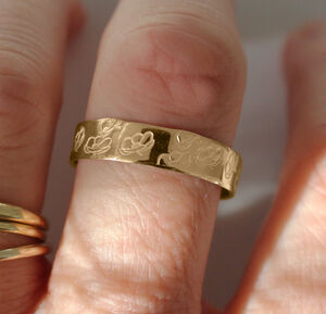 engraved-logo plaque band ring