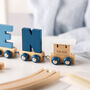 Engraved New Baby Polar Wooden Name Train, thumbnail 9 of 12