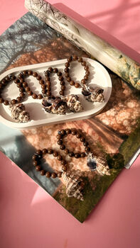 Set Of Two Handmade Sea Shell Napkin Rings With Wooden Beads, 3 of 9