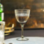 A Set Of Four Smoky Wine Glasses With Ovals Design, thumbnail 1 of 2