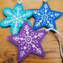 Star And Snowflake Linocut Wooden Christmas Decorations, thumbnail 2 of 5