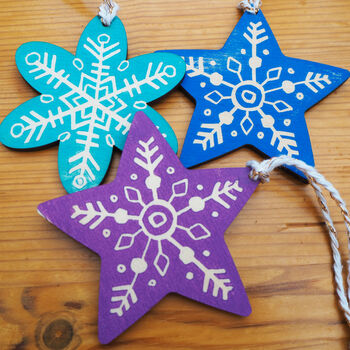Star And Snowflake Linocut Wooden Christmas Decorations, 2 of 5