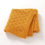 Ochre Organic Cotton Knitted Cellular Baby Blanket, thumbnail 1 of 2