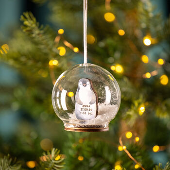 Personalised Illustrated Penguin First Christmas Snow Bauble, 4 of 7