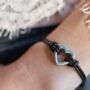 Woman's Personalised Black Leather Remembrance Bracelet For Ashes Heart Urn, thumbnail 1 of 10