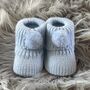 Blue Knitted Baby Booties With Pom Pom, thumbnail 1 of 7