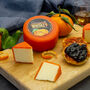 Orange And Whiskey Cheddar Cheese Truckle 200g, thumbnail 1 of 2