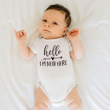 'Hello I'm New Here' Babygrow | New Baby Gift By Oliver + Alexander